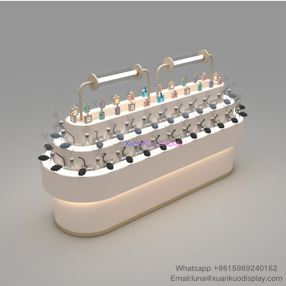 cream white curved fragrance display furniture, multi-tier layered perfume tester display island, built-in ambient base lighting, overhead light bars, dedicated holders for fragrance funnels and perfume bottles, central sampling counter for perfume & scent boutique