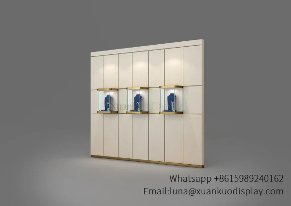 Wall mounted vertical jewelry display cabinet with gold frame and built-in LED glass display boxes for jewelry boutique