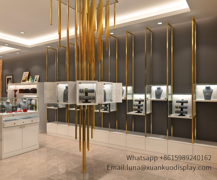 glass jewellery display cabinets modern jewellery showroom design with gold framed display furniture and central art installation