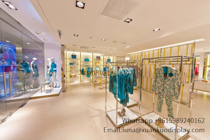 gold stainless steel custom apparel display furniture for designer fashion boutique