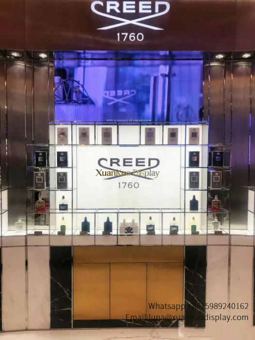 luxury fragrance display marble perfume kiosk interior