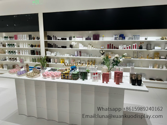 skincare display island with gold metal border