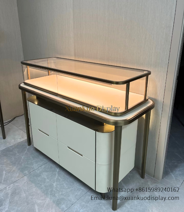 Custom metal frame jewelry showcase with LED lighting and storage drawers for jewelry shop display